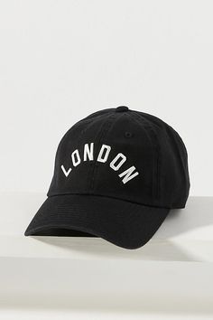 Always ready for every adventure, the Wanderlust Baseball Cap is your go-to finishing touch, whether running for coffee (or running for that flight). | The Wanderlust London Baseball Cap by Anthropologie in Black, Women's, Cotton Baseball Hats For Women, Anthropologie Gifts, Cool Baseball Caps, White Baseball Cap, Travel Must Haves, Style Goals, Black Baseball Cap, Womens Baseball Cap, Baseball Hat