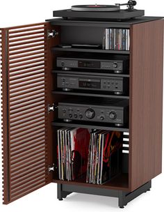 an entertainment center with many different types of audio equipment