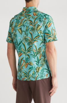 Bright flowers bloom among thick tropical foliage on a shirt crafted in Hawaii from crisp, breathable cotton with a flat hem that stays untucked and casual. 29 1/2" length; 44" chest (size Medium) Front button closure Cutaway collar Short sleeves Chest patch pocket 100% cotton Machine wash, tumble dry Made in the USA of imported fabric Men's Clothing Relaxed Fit Tropical Button-up Camp Shirt, Tropical Floral Print Button-up Shirt, Hawaiian Button-up Printed Camp Shirt, Tropical Cotton Button-up Hawaiian Shirt, Cotton Tropical Print Button-up Camp Shirt, Cutaway Collar, Ted Baker London, Cozy Gift, Man Up