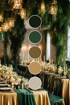 the table is set up with gold and green linens, candles, and greenery