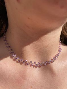 Discover the beauty of nature with this stunning Amethyst Faceted Crystal Bead Choker. The delicate purple amethyst beads catch the light, illuminating your neckline with a soft violet glow. Faceted 2mm amethyst beads strung on gold tone wire Fully adjustable from 36cm to 40cm Handmade choker style necklace to accent your neck. Let this gorgeous Amethyst Faceted Crystal Bead Choker add a pop of radiant colour to your outfit. The versatile 36cm to 40cm length can be worn high on the neck or lower Purple Necklaces With Tiny Beads As Gift, Purple Tiny Beads Necklace As Gift, Purple Necklace With Tiny Beads Gift, Lavender Jewelry With Tiny Beads For Gifts, Purple Tiny Beads Necklace Gift, Lavender Gemstone Beaded Necklaces As Gift, Lavender Gemstone Beaded Necklaces For Gift, Lavender Gemstone Beads Necklace For Gift, Lavender Crystal Necklaces With Faceted Beads For Gifts