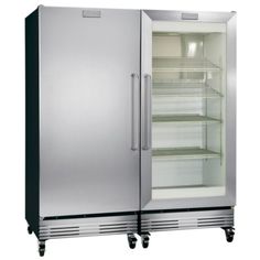 two stainless steel refrigerators sitting side by side on casteors with shelves and doors open