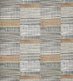 an upholstered rug with different colored stripes and lines on the side, in various colors