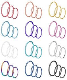 six pairs of thin metal rings with different colors and sizes, all on white background