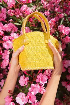 Natural and yellow raffia bag. The Gigi is your best ally for all occasions ! As a beach bag, a city basket or an evening purse to dress up your outfit, the Gigi is fit for all occasions and for all women. This trendy raffia bag is handmade in the purest tradition of raffia weaving. Carry by hand or at the shoulder, it is therefore the perfect fashion accessory ! But that's not all ! The Gigi aims to embellish your daily life every season with positivity and kindness throughout lithotherapy. Tha Raffia Weaving, Raffia Bag, Evening Purse, Quartz Rose, Natural Red, Beach Bag, Daily Life, Straw Bag, Rose Quartz