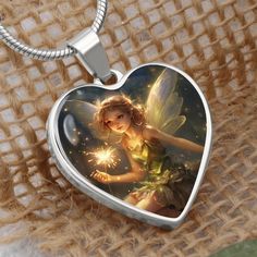 Discover the magic and strength of the Ellyllon Wales Fairy with our Fairy Heart Pendant, a masterpiece designed to exceed your highest expectations and bring enchantment into the life of someone special. This astonishing necklace, featuring a meticulously engraved design of the Ellyllon Wales Fairy on the heart pendant, is not just a piece of jewelry; it's a token of love, strength, and protection. Crafted from high-quality surgical steel with a liquid glass coating for a shatterproof finish and an optional 18k gold finish, this pendant is a testament to enduring love and the mystical power of nature's guardians. Made in the U.S by talented working moms, this piece celebrates strong communities and the spirit of craftsmanship. Embrace the Ellyllon Wales Fairy's blessings of strength and p Magical Sterling Silver Necklace As A Gift, Fairycore Sterling Silver Jewelry Gift, Fairycore Sterling Silver Jewelry For Gifts, Silver Fantasy Necklace For Gifts, Fantasy Style Silver Necklaces As A Gift, Fantasy Style Silver Necklaces For Gifts, Fantasy Style Silver Necklace As Gift, Fairy Style Silver Jewelry For Gift, Fantasy Sterling Silver Necklace For Gift