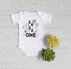 Baby First Birthday Onesie® New Years Baby 1st Birthday | Etsy New Years First Birthday, New Years Eve Birthday, Baby Halloween Onesie, Baby Onesie Ideas, First Birthday Onesie, Baby Boy Halloween, Onesie Ideas, Gerber Organic