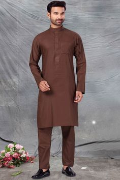 Product Features: Top Color: Chocolate Brown Bottom Color: Chocolate Brown Work: Solid Top Fabric: Fine poly and cotton mix Bottom Fabric: Fine poly and cotton mix Pack Of: 1 Kurta : 1 Salwar Occasion: Partywear Disclaimer: There will be slight difference in digital to actual image Casual Cotton Sets Plain, Plain Cotton Long Sleeve Sets, Casual Cotton Tops For Eid, Plain Long Sleeve Cotton Sets, Fitted Cotton Top For Eid, Casual Cotton Kurta For Winter, Casual Cotton Festive Sets, Fitted Brown Cotton Sets, Casual Cotton Sets For Festive Season