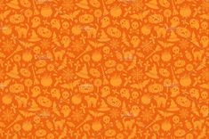 an orange halloween background with skulls and pumpkins