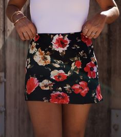 Unleash your playful side with our Floral Elegance Mini Skirt. Perfect for any occasion, this skirt features a beautiful floral pattern and exudes elegant charm. Let your style bloom with this must-have addition to your wardrobe. Fabric 100% polyester Zipper in back. Chic Printed Summer Skirt, Brunch Floral Print Mini Skirt, Floral Print Relaxed Mini Skirt, Chic Skirted Bottoms With Floral Print, Relaxed Floral Print Mini Skirt, Elegant Printed Summer Skirt, Fitted Floral Print Mini Skort, Spring Floral Mini Skirt, Chic Floral Mini Skirt