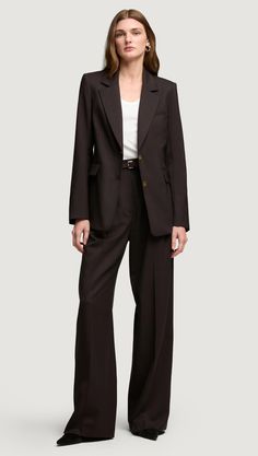 Our slouchy Pleated Trouser is a timeless piece that finds balance in touting both a wide-leg and a slim fit. The pant borrows from traditional suiting with a curtained waistband — which sits at the natural waistline for a flattering appearance — alongside pleated detailing. Sleek Long Sleeve Blazer With Button Closure, Fitted Single-button Wool Blazer, Semi-formal Wool Blazer With Double Button Closure, Sleek Single-breasted Structured Blazer, Sleek Single-breasted Wool Blazer, Womens Wool Pants, Green Monday, Denim Outerwear, Peak Lapel