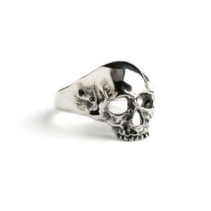 Beautifully detailed skull ring hand made out of sterling silver. Although the morbidity of skulls they are also symbolise rebirth, renewal, and spiritual awakening. Material: 925 Sterling Silver Sizes: US 6-9 Length: approx 22mm Silver jewellery can be clean with a phosphate-free detergent or a non abrasive cloth made for cleaning jewellery. All of our jewellery packed in our labeled gift box For more of our rings, click here: https://www.etsy.com/uk/shop/Tribulondon?ref=simple-shop-header-name Grunge Ring, Goth Ring, Sterling Silver Skull Rings, Chunky Silver Rings, Grunge Jewelry, Edgy Jewelry, Silver Skull Ring, Packing Jewelry, Gothic Rings