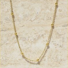 Our 14K gold-filled satellite chain is the perfect companion to layer with other necklaces. Wear on its own or layer with other necklaces. It is easy to wear everyday in any occasion and makes for the perfect gift for her. Our 14k gold-filled jewelry is bonded with 14k gold and is water and tarnish resistant. 14k gold-filled jewelry is a great alternative to solid gold, and can be worn by people with sensitive skin. - 14K gold-filled- Chain width: 2.5 mm. - Chain length: 15" + 2" extension- Wate Sun Necklace, Gold Necklace Set, Gift Pouch, Gold Filled Jewelry, Perfect Gift For Her, Chain Lengths, Chain Length, Gold Chain, Gold Chains