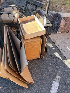 a pile of junk sitting on the side of a road