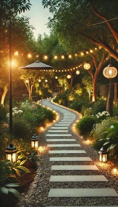 an outdoor pathway with lights and lanterns on the sides, surrounded by plants and trees