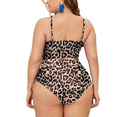 Introduction: Make a fierce statement at the beach or pool with these leopard print mesh spliced high waist bikini bottoms. The combination of the daring print and the sheer mesh panel creates a sexy and bold look that is sure to turn heads. The high waist design offers flattering coverage while the spliced detailing adds a touch of edginess to the overall designMaterial: Synthetic fiber blendColors: Leopard print, black, wine redSizes: 0XL, 1XL, 2XL, 3XL, 4XLProduct: SwimsuitStyle: Triangle bot Leopard Print Swimsuit, Streetwear Coat, Swimsuits High Waisted, Print Swimsuit, Swimsuit Fashion, Mesh Panel, Bra Lingerie, Olivia Mark, Synthetic Fiber