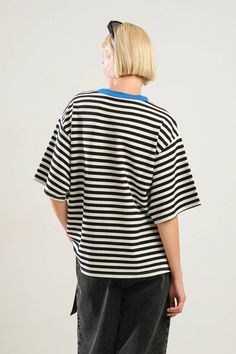 A striped knit top with round neckline and short sleeveDetails:Self : 95% Cotton 5% SpandexContrast : 65% Cotton 30% Polyester 5% SpandexSize & Fit- Model is 5`8" And Wearing Size Small- Measurements Taken From Size Small- Approx. Length: 26.5" Black Horizontal Stripe Short Sleeve T-shirt, Black Crew Neck T-shirt With Horizontal Stripes, Black Sporty Tops With Striped Collar, Black Short Sleeve Top With Striped Hem, Black Short Sleeve T-shirt With Contrast Stripes, Black T-shirt With Contrast Stripes, Black Short Sleeve T-shirt With Striped Collar, Christmas In July Sale, Kimono Sweater