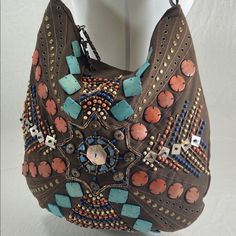 Thank You For Clicking Our Charm Luck Brown Canvas Western Shoulder Slouch Bag Purse Turquoise Beaded New New, Unused Canvas Slouch Bag With Lots Of Western Style And Flair! The Seed Bead, Applied Stone And Metal Stud Work Is So Eye-Catching And Unique! Think Yellowstone! -Braided Real Leather Strap -Wonderfully Intricate Bead, Stone And Stud Work -Dual Zipper Closure With Charm And Luck Spell-Out Metal Pulls. -Such A Pretty Pink Inside Lining With Zipper Pocket And Double Credit Card Slip Pocke Bohemian Beaded Bags For Vacation, Bohemian Beaded Shoulder Bag For Summer, Bohemian Beaded Shoulder Bag For The Beach, Bohemian Beaded Shoulder Bag For Beach, Summer Bohemian Beaded Shoulder Bag, Bohemian Beaded Shoulder Bag For Vacation, Bohemian Embellished Bags For Vacation, Bohemian Embellished Bag For Vacation, Beach Embellished Rectangular Shoulder Bag