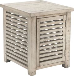 the side table is made out of wood and has an open shutter design on it