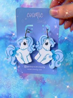 This listing is for ONE Pair of Winter Pony Earrings. Hoops are hypoallergenic. If you wish to replace with lever backs or hooks please leave me a note at checkout. Earrings are approximately 2" - Follow me on IG for shop updates! @shopcosmiclovelySubscribe to my newsletter for exclusive coupons! Winter Witch, 80s Inspired Outfits, Crazy Earrings, Kawaii Items, Diy Kandi Bracelets, Alt Clothing, Daisy Scouts, Diy Kandi, Padded Wall