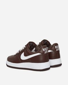 Make your Instagram feed fly high with the Nike Air Force 1 Low Retro QS Sneakers Chocolate / White. Soft textured leather in chocolate brown and crisp white pops perfectly on any photo, while perforations keep feet fresh. Subtle embroidery and classic woven details turn heads both online and off. A true sneaker icon since the '80s, these Air Force 1s cushion every step in iconic style that's built to last through all your posts, likes and shares. Nike Air Force 1 Leather White Sole Sporty, Nike Air Force 1 Sporty Leather Lace-up, Nike Air Force 1 Leather Lace-up Sporty Shoes, Nike Air Force 1 Leather With Embossed Logo Lace-up, Brown Leather Sneakers With Embossed Logo, Nike Air Force 1 High-top Leather With Perforations, Brown Low-top Sneakers With Embossed Logo, Nike Air Force 1 Sports Leather With Embossed Logo, Nike Air Force 1 Leather Sports Shoes With Perforations