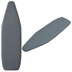 a gray surfboard laying on top of it's side next to a white background