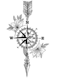 a black and white drawing of a compass with flowers