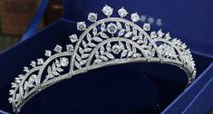 This tiara is beautifully silver-plated and encrusted with sparkling clear genuine zirconium stones of various sizes. The many zirconium Stones make this crown sparkle in any light and are prong set by hands! This piece is versatile and compliments many different styles, can be worn for Weddings, Bridal Showers, Birthdays, Baby Showers, Graduation, Maternity Shoots or any special occasions! Handmade Bridal Tiaras/Crown Made to Order Diamond Weight -- 20.54ct Diamond -- American Diamonds/Zircon D Elegant Tall Crown With Rhinestones, Elegant Silver Crown With Rhinestones, Elegant Crystal Crown For Party, Elegant Crystal Crown For Wedding, Silver Wedding Crown With Rhinestones, Silver Rhinestone Wedding Crown, Elegant Silver Crown For Wedding, Silver Teardrop Crystal Crown, Silver Crystal Wedding Crown