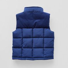 Designed for function and warmth, this toddler and little boy's textured puffer vest from Okie Dokie will keep him cozy through transitional weather to colder temps. Made from a soft woven-blend with a corduroy trim detail along the top, it has a midweight fleece fill, a mock neck, side slip pockets, and a full-zip closure.Closure Type: ZipperPockets: 2 Front Slip PocketsWarmth Factor: MidweightOuterwear Length: ShortFiber Content: 100% Mixed FibersFabric Description: WovenFilling Content: 100%… Navy Blue Puffy Vest Outfit, Boys Winter Vest, Toddler Quilted Vest, Puffer Vest Baby Boy, Navy Puffer Vest, Puffer Vests, Okie Dokie, Puffer Vest, Trim Detail