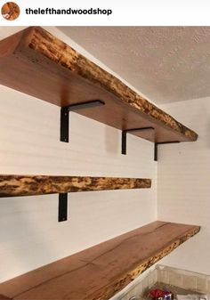 the shelves are made out of wood and have metal brackets on each shelf, along with other wooden shelving