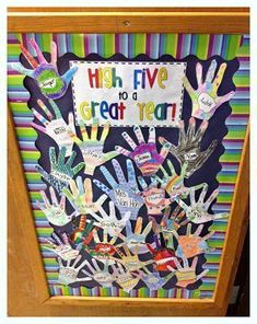 a bulletin board with handprints on it