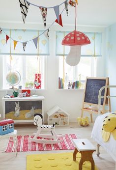 a child's room with toys and decor