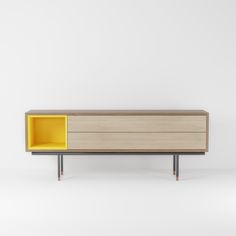 the sideboard is made out of wood and has yellow drawers