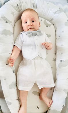 Baby boy baptism outfit for summer, baby boy christening outfit short sleeve, boy baptism outfit bowtie, christening outfits for boys Amazing outfit for the christening of your baby : a white bodysuit with attached vest + linen shorts + bowtie comes for free (it goes in gray color by default but you can write to me and order white or light blue bowtie instead). Moreover, you can make any combination: say combine gray shorts and matching gray bowtie (or blue) if you prefer.  The most important th Fitted White Sets With Bow Tie, White Fitted Sets With Bow Tie, Elegant Sets For First Communion In Summer, Elegant Summer Sets For First Communion, Formal Short Sleeve Baptism Dress For Summer, Formal Baptism Dress With Short Sleeves For Summer, Summer Formal Baptism Dress With Short Sleeves, Formal Summer Baptism Dress With Short Sleeves, Elegant First Communion Sets For Summer