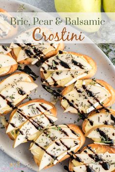 brie, pear and balsamic crostini on a white plate