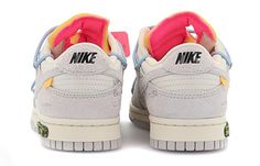 The OFF-WHITE x Nike Dunk Low The 50 NO.38 is a limited edition sneaker collaboration between Virgil Abloh's OFF-WHITE label and Nike. It features a white leather upper with soft grey suede overlays, as well as Virgil's signature touches like the plastic zip tie and printed Helvetica text. Contrasting pops of color arrive via the sneaker's secondary lacing system, zip-tie, exposed-foam tongue and rectangular tab affixed to the Swoosh. Off White X Nike, Nike Off White, Nike Sacai, Womens Air Jordans, Limited Edition Sneakers, Cute Nike Shoes, Fresh Shoes, Cute Nikes, Swag Shoes