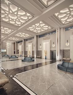 an empty lobby with marble flooring and white walls, along with benches on either side