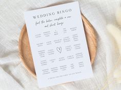 a wooden plate topped with a wedding game