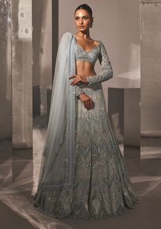 Ritika Mirchandani-Miray Iceblue Silver Lehenga Set-INDIASPOPUP.COM Luxury Silver Floor-length Lehenga, Luxury Embroidered Silver Choli, Luxury Silver Semi-stitched Lehenga, Luxury Silver Blouse With Resham Embroidery, Luxury Silver Lehenga For Formal Occasions, Abstract Lehenga, Blue Reception Lehenga, Ice Blue Lehenga, Silver Lehenga