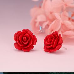 These rose flower big stud earrings feature an elegant resin rose flower in white or red color with 925 sterling silver needle and back pieces. Elegant rose flower design makes these earrings a perfect wedding, bridal jewelry gift or can wear every day to elevate your outfit.Dimensions of the rose is about 2 cm. Jewelry Care: See more information about how to care for your jewelry here. Shipping Policy: Orders will be shipped within 1-3 business days. Economy shipping will take 7-14 days to arri Formal Rose Earrings With Rose Design, Formal Rose-design Rose Earrings, Flower Shaped Rose Earrings For Gift, Rose Flower Earrings For Gift, Rose Red Flower Earrings With Rose Design, Rose Design Flower Earrings For Formal Occasions, Rose Design Flower Earrings For Anniversary, Formal Rose Design Earrings, Rose-colored Flower Earrings For Valentine's Day