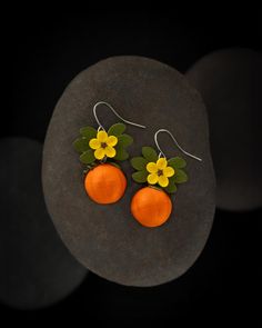 These pumpkin earrings capture the essence of fall, embodying the warmth and coziness of the season. With their rich orange hues, they add a playful touch to any autumn outfit, celebrating harvest vibes and festive fall traditions. Perfect for seasonal charm! Size: Length: 1.25 Inches; Drop length: 1.75 Inches; Width: 1 Inches  These quilled earrings are attached to hypoallergenic hooks! The paper earrings are aesthetically packaged and will be shipped within 3-5 business days after order confirmation. Paper Quilling Earrings, Quilling Earrings, Quilled Jewellery, Fruit Earrings, Paper Earrings, 1st Anniversary Gifts, Pumpkin Earrings, 1st Anniversary, Anniversary Gift For Her