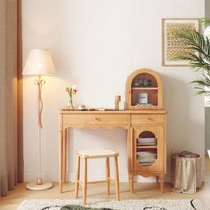 a room with a desk, chair and rug in it