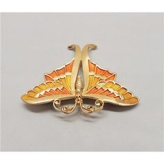 This is part of Chairish’s Costume Jewelry assortment.  Goldtone orange and yellow enamel butterfly brooch with security clasp. Marked "Napier." Measures: 2 1/8 inches long by 2 3/4 inches wide. Condition: Very good; one small section is missing yellow enamel-looks like it might have been manufactured that way- I only noticed it in the pictures as it's very small, but priced accordingly. A blue and green enamel version of this brooch was featured in a c1971 advertisement.  Please reference the m Enamel Butterfly, Antique Pins, Butterfly Brooch, Modern Branding, Orange And Yellow, Green Enamel, Blue And Green, Orange Yellow, Vintage Signs