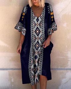 Details:Flared SleevesPattern:Geometric PatternFit Type:OversizedHem Shaped:FlaredNeckline:V-NeckLength:LongSeason:SummerSleeve Length:ShortStyle:BohemianMaterial:PolyesterSleeve Style:Flare SleeveSIZE(cm)BustLengthS95cm(37.5inch)103cm(40.6inch)M100cm(39.4inch)104cm(41.0inch)L105cm(41.4inch)105cm(41.4inch)XL110cm(43.4inch)106cm(41.8inch)2XL115cm(45.3inch)107cm(42.2inch)3XL120cm(47.3inch)108cm(42.6inch)4XL125cm(49.3inch)109cm(43.0inch)5XL130cm(51.2inch)110cm(43.4inch) V-neck Dresses With Geometric Pattern For Beach, Bohemian Shift Midi Dress For Beach, Bohemian Patterned Midi Dress With Short Sleeves, Bohemian Shift V-neck Dress, Bohemian Floral Print Shift Maxi Dress, Bohemian V-neck Shift Maxi Dress, Bohemian V-neck Shift Dress, Bohemian Shift Midi Dress Knee-length, Bohemian Shift Midi Dress