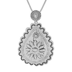 Capture the charm of the American Southwest with this concho pendant from Southwest Elements! Crafted from sterling silver, the pendant features detailed oxidized designs from engravings to beautiful flowers. Wear with the included 18-inch popcorn chain or a favorite from your own collection. Add the matching earrings 208-224 to complete your look! Concho Sterling Silver Necklace For Gifts, Sterling Silver Concho Necklace For Gift, Silver Concho Pendant Jewelry, Bohemian Sterling Silver Necklace With Concho, Vintage Sterling Silver Concho Necklaces, Vintage Sterling Silver Concho Necklace, Faux Fur Fashion, Element Necklace, Mens Gold Jewelry