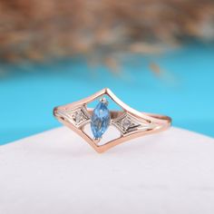 "Anniversary ring, Art deco ring, Topaz ring, Marquise ring, Women ring, Geometric ring, Rose gold ring, Elegant ring, Delicate ring WE OFFER UNLIMITED PERIOD INSTALLMENTS PLAN This is a beautiful, stunning, feminine ring that works well for all occasions, styles, and ages. You will love it! Same ring in white gold: https://www.etsy.com/listing/294832061/topaz-ring-art-deco-ring-gemstone-ring?ref=shop_home_active_1 Ring information: Main stone: Swiss Topaz Approximate size: 6*3 mm Accent stone: Heirloom Topaz Rings For Gift, Fine Jewelry Marquise Topaz Ring, Marquise Topaz Ring Fine Jewelry Gift, Marquise Topaz Ring For Gift, Marquise Ring With Diamond Accents For Gift, Unique Marquise Rings For Formal Occasions, Marquise Rings With Diamond Accents Gift, Marquise Cut Topaz Ring Fine Jewelry, Topaz Gemstone Open Ring