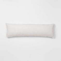 a white pillow on a white background