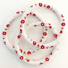 BEADED BRACELETS FOR WOMEN, HANDMADE WITH LOVE: ❤️ This handmade seed bead bracelet has been thoughtfully designed, and carefully hand crocheted onto cotton thread one bead at a time, by skilled Nepali women artisans. 100s of high quality glass seed beads from the Czech Republic, go into each bracelet design to create a beautiful work of art for your wrist.✨ 7" SIZE: Designed for wrist sizes up to 6.75", with a comfortable fit that gently hugs your wrist. 🙌 YOUR PURCHASE MATTERS: ❤️ Your purcha Handwoven Beaded Bracelets With Round Beads, Handwoven Beaded Bracelets For Beach, White Handwoven Bracelets With Round Beads, Gift Beaded Thread Bracelets, White Handwoven Beaded Bracelets As Gift, Handwoven White Beaded Bracelets For Gifts, White Handwoven Bracelets, Handmade Thread Beaded Bracelets As Gifts, White Beaded Bracelets For Crafting With Tiny Beads