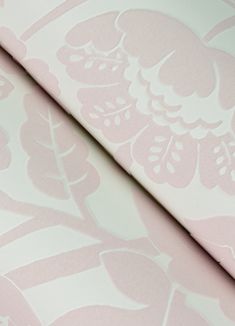 a pink and white wallpaper with flowers on it