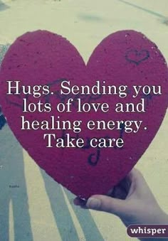 someone holding up a heart with the words hugs sending you lots of love and healing energy take care